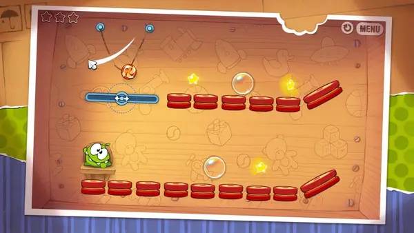 Кадр с взаимодействием персонажа и объекта в Cut the Rope
