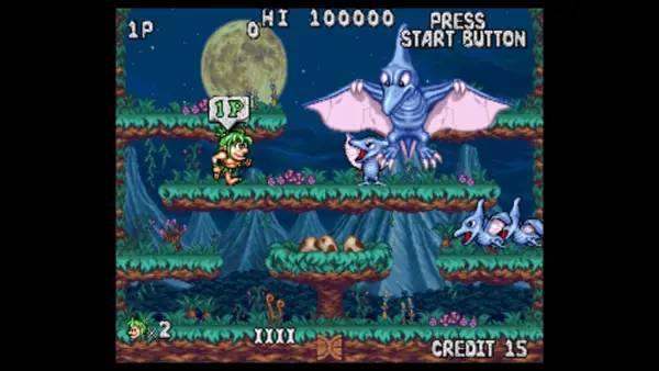 Кадр с взаимодействием персонажа и объекта в Retro Classix  Joe and Mac Returns