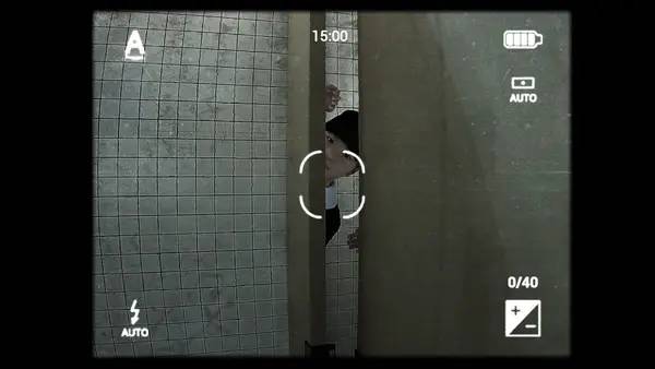 Момент активного игрового действия Cursed Digicam