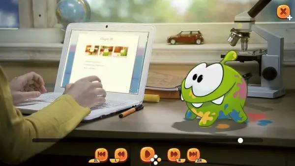 Персонаж Om Nom  Coloring, Toons and Puzzle в процессе выполнения задания